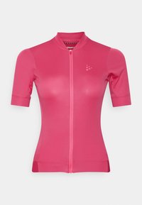 Cyklistický dres s krátkým rukávem v jasně růžové barvě, vybavený plným předním zipem a stojáčkovým límcem. Hladká textura s minimálním logem.