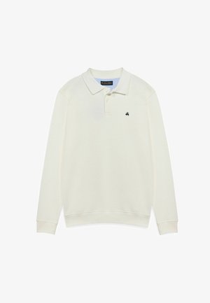 Bílé polo tričko s dlouhým rukávem, dvouknoflíková léga a malým motivem palmy v tmavě modré barvě na levém hrudi.