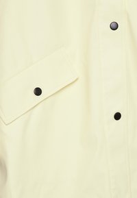 ONLY ONLELISA - Casaco impermeável - pastel yellow