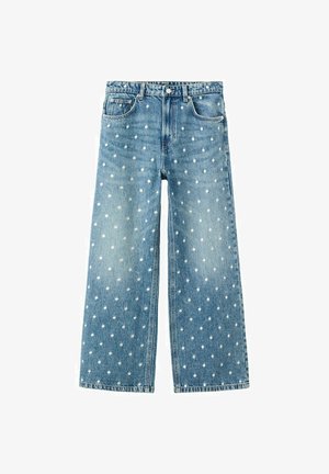 Niebieskie szerokie dżinsy z denimu z białymi grochami, przednimi kieszeniami, szlufkami na pasek i zapięciem na guziki.