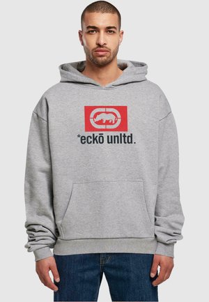 Gray hoodie with large front pocket, featuring red and black graphic logo. Material appears soft, with ribbed cuffs and hem for fit.