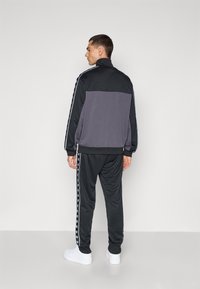 Champion SPORT HERITAGE TRACKSUIT SET - Træningssæt - black