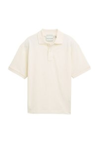 Korte mouwen polo shirt in licht crèmekleurig, gemaakt van katoen. Beschikt over een klassieke kraag en een knoopsluiting met drie knopen. Soepele textuur, relaxte pasvorm.