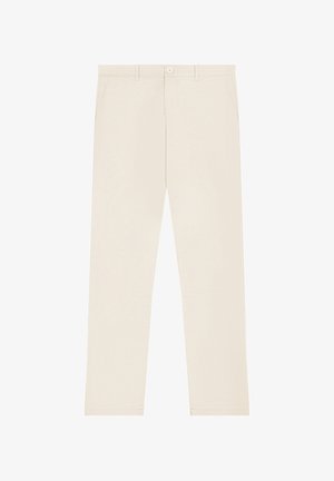 Beiget, kapeat housut, joissa on vyölenkit, etunapit ja vetoketjusulku sekä sivutaskut, esillä valkoisella taustalla.