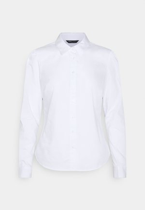 Chemise blanche à manches longues, ajustée, avec col, légèrement bouffantes et à ourlet incurvé de la collection M&S.