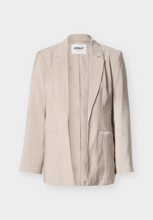 Beige damesblazer met lange mouwen, keperkragen, twee voorzakken en een label met de tekst "ONLY" aan de binnenkant van de kraag.
