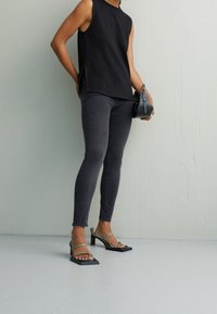 AG Jeans Vaqueros pitillo - black