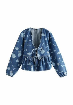 Blusa in denim con scollo a V profondo e parte anteriore con coulisse, caratterizzata da vita peplum e motivo floreale azzurro su sfondo blu scuro.