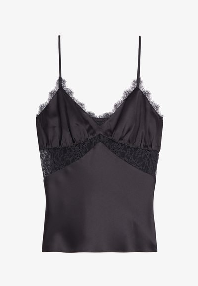 Camisole en satin noir avec une bordure en dentelle le long de l'encolure. Dotée de bretelles spaghetti et d'un insert en dentelle au centre. Texture lisse.