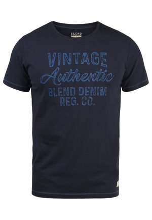 Navy blue cotton t-shirt with short sleeves, featuring bold "VINTAGE Authentic" text and subtle stitching details along the hem and sleeves.