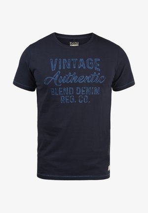 Navy blue cotton t-shirt with short sleeves, featuring bold "VINTAGE Authentic" text and subtle stitching details along the hem and sleeves.