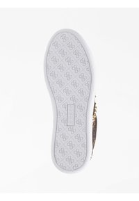 Witte rubberen buitenzool met een herhaald logo-patroon en een textuurontwerp voor grip en stabiliteit. Kenmerkende branding op de hiel.