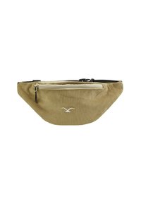 Khaki Cordura-Bauchtasche mit einem cremfarbenen Reißverschluss, verfügt über ein Logo auf der Vorderseite und hat einen schwarzen verstellbaren Gurt. Strukturierte Oberfläche.