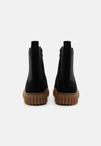 Clarks TOR HILL TOP UNISEX - Botas - black