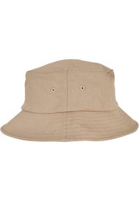 Beige bomullsbøttehatt med flat krone, bred brem og to ventilasjonsøyne på hver side. Har sydd sømmer for ekstra tekstur.