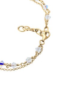 Guld kedjearmband med klara, fasetterade pärlor. Designen inkluderar en säker lås och varierade länkar, vilket ger ett delikat och intrikat utseende.