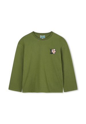 Olijfgroen langemouwen shirt van zachte katoen, met een roze en zwarte geborduurde bloemenpatch op de linkerkant van de borst. Ronde halslijn.
