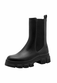 Stivale Chelsea in pelle nera con pannelli elasticizzati ai lati, suola testurizzata e tacco leggermente rialzato. Presenta un loop per una facile calzata.
