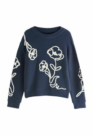 Marineblå fleece-trøje med lange ærmer, med hvid blomsterbrodering på forside og ærmer. Rund halsudskæring og afslappet pasform.