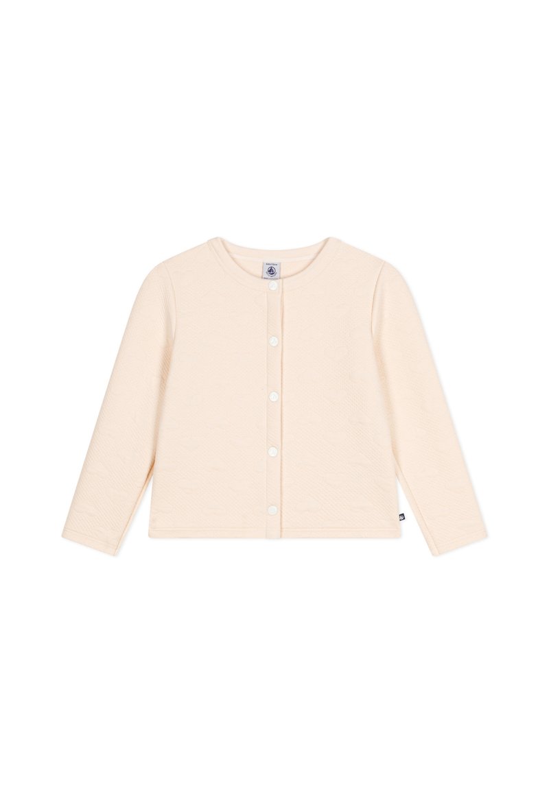 Cardigan in cotone di un beige chiaro, con maniche lunghe, scollo rotondo e chiusura con bottoni. Presenta un sottile motivo testurizzato e un'etichetta con il logo sul lato.