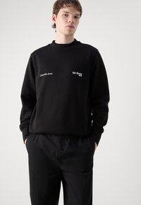 Calvin Klein Jeans 1978 CREW NECK - Melegítőfelső - black