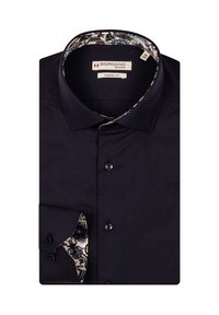 Donker marineblauwe dress shirt met een moderne pasvorm, voorzien van zwarte knopen en accenten van een bloemenpatroon in de binnenkraag en manchetten.