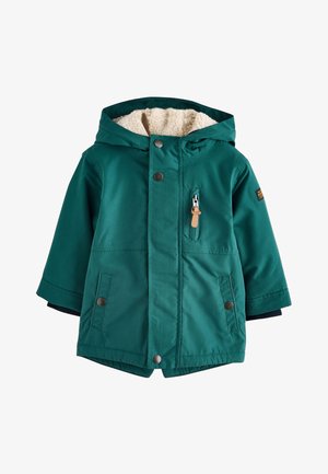 Teal-värinen hupullinen lasten talvitakki sherpa-vuorella, etuvetoketjulla, painonapeilla ja vetskulla varustetulla rintataskulla, jossa on nahkainen vetokahva.