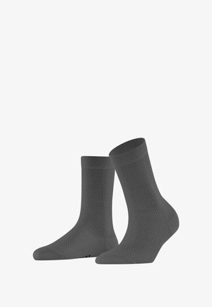 Szare skarpetki ze wzorem w jodełkę, średniej wysokości, z prążkowanym mankietem i wzmocnionym palcem; wykonane z miękkiego, rozciągliwego materiału.