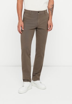 Brown cotton casual pants with a slim fit design, featuring a button and zipper closure, front pockets, and a smooth texture.