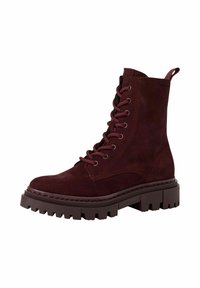 Bottines en suède bordeaux à lacets, dotées d'une semelle en caoutchouc épaisse et crantée, et d'une poignée à l'arrière pour un enfilage facile.
