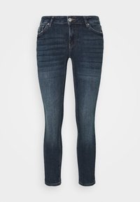 Jeans de ganga azul escuro com um corte slim, apresentando um fecho de correr clássico, cinco bolsos e um desbotado subtil na parte da frente.
