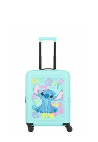 Valigia rigida turchese caratterizzata da un personaggio dei cartoni animati con grandi orecchie, motivi floreali, ruote nere e un manico retrattile.