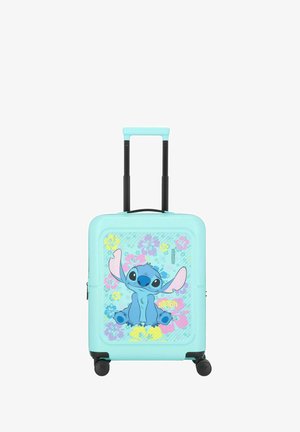 Valise en dur turquoise avec un personnage de dessin animé aux grandes oreilles, des motifs floraux, des roues noires et une poignée rétractable.