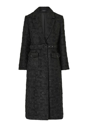 Black textured long coat with a belted waist, notch collar, long sleeves, and two front buttoned flap pockets.