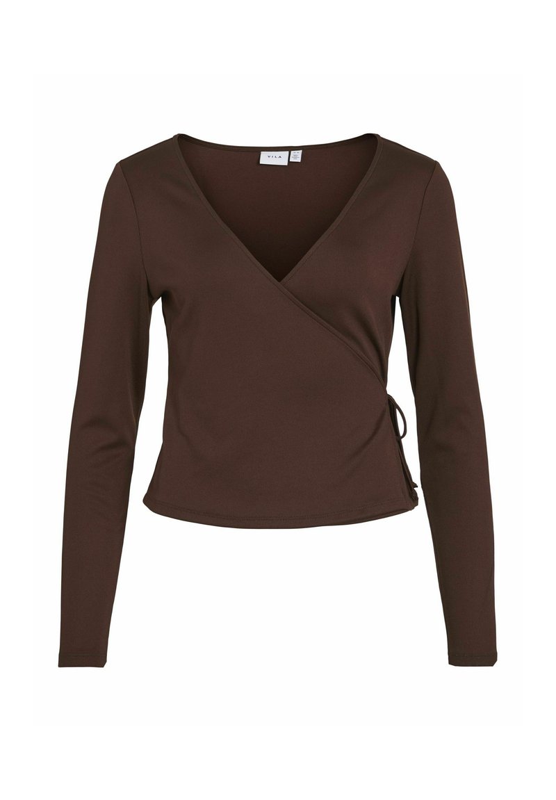Top avvolgente marrone a maniche lunghe realizzato in materiale morbido, con scollatura a V e dettaglio di legatura laterale, caratterizzato da una silhouette aderente.