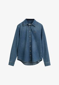 Unselected, semi light blue worn in