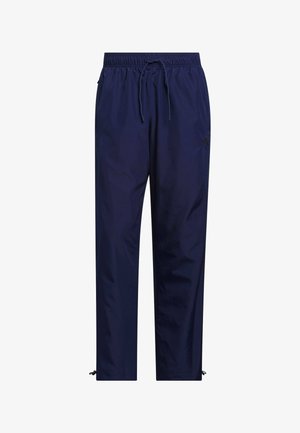 Navyblauwe lichtgewicht broek met elastische tailleband, voorste trekkoord en verstelbare enkelkoordjes voor een stevige pasvorm.