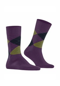 Lila Baumwollsocken mit einem Diamantmuster in Grün und Schwarz, ergänzt durch kontrastierendes türkises Stiching und gerippte Bündchen für zusätzlichen Textur.