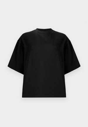 T-shirt de algodão preto com decote redondo, mangas curtas oversized e um design solto. Textura suave e estilo minimalista.