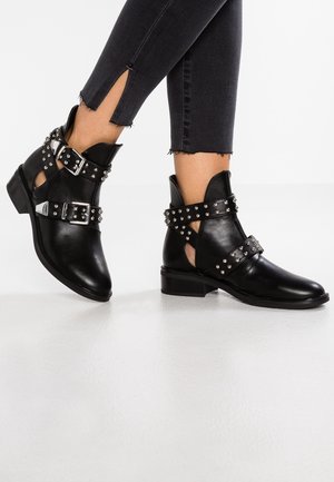 Biker-/cowboynilkkurit - black