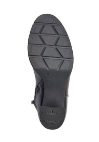 Semelle de chaussure en caoutchouc noir avec un motif de semelle hexagonal pour une meilleure adhérence, dotée d'une finition lisse et d'une taille marquée en relief "37".