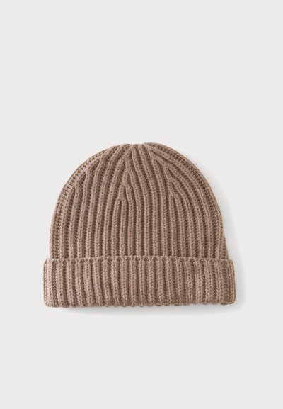 Bonnet en laine marron tricoté avec un revers, présenté à plat sur un fond clair.