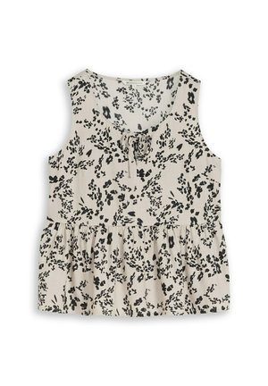 Blouse beige sans manches avec imprimé floral noir, col rond, détail noué à l'avant et basque froncée à la taille.