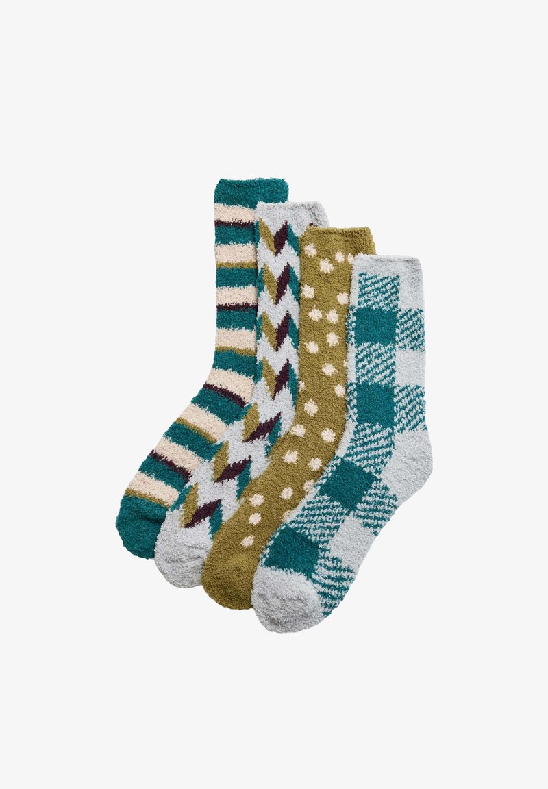 Conjunto de cuatro calcetines con diferentes текстuras y patrones: rayas, chevron, lunares y cuadros en tonos teal, oliva, crema y gris.