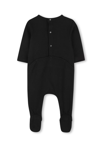 Body nero in cotone con maniche lunghe, bottoni a pressione sulla schiena, piedi coperti e tasche frontali. Tessuto morbido, design semplice.