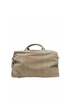 Beige leather duffel bag with smooth texture, dual handles, adjustable shoulder strap, and a zipper closure. Minimalistic design, no visible patterns.