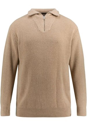 Pull en tricot beige avec un col zippé mi-long, texture côtelée et manches longues. Présente un ourlet fendu et des motifs verticaux subtils.