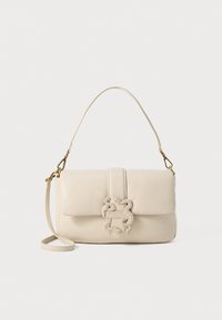 Cream leather handbag with a flap closure, gold hardware, and a braided decorative accent. Features a detachable shoulder strap.