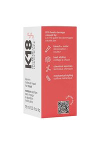 Doos van K18 leave-in haarmasker, wit en rood ontwerp, bevat opvallende tekst en een QR-code, bevat 15 ml product, benadrukt de voordelen voor het herstel van beschadigd haar.