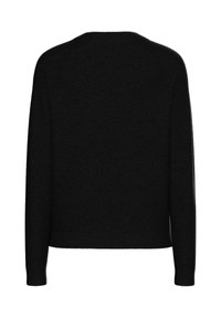 Μαύρος πλεκτός σούπερ με στρογγυλή λαιμόκοψη, μακριά μανίκια και χαλαρή εφαρμογή. Το υλικό φαίνεται μαλακό με υφή.